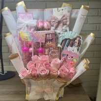 Pink gift bouquet with skincare and treats
